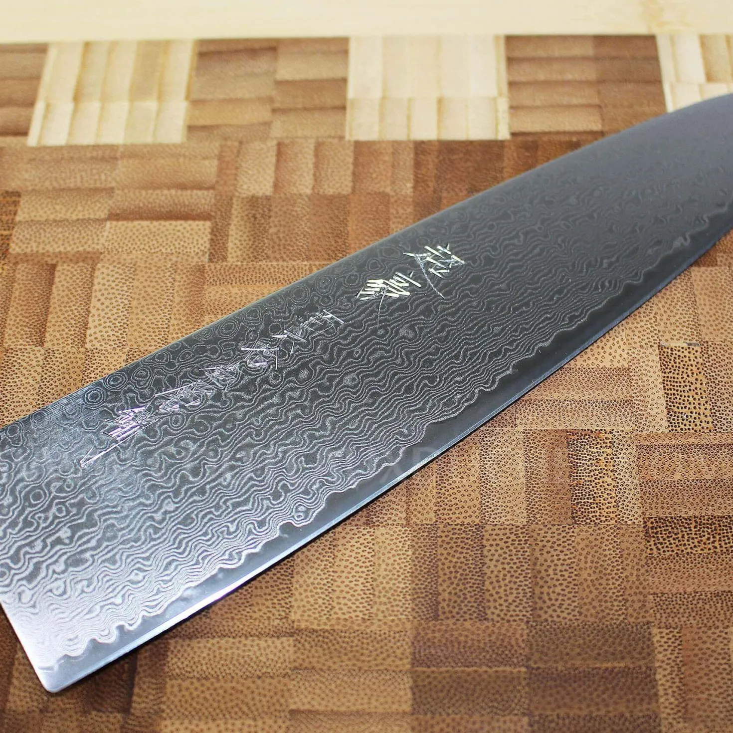 Couteau de chef japonais Yaxell SUPERGOU lame 20cm damas 161 couches