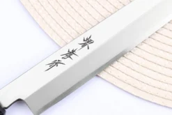 Couteau yanagiba japonais 24cm Sakai Takayuki Nanairo manche en résine ABS laquée