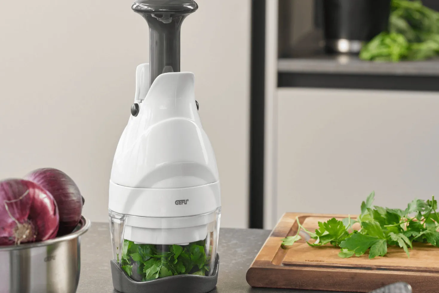 Hachoir de légumes et de fines herbes Gefu en inox et ABS