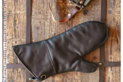 Manique Alaskan Maker Defender noir et orange en cuir