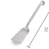 Spatule ajourée Gefu Baseline acier inox 32.7cm