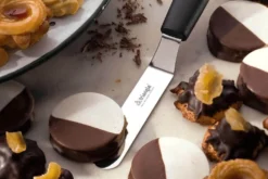 Spatule de pâtissier coudée Triangle professionnelle manche en green grip