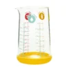 Verre doseur Pebbly en verre borosilicate et base en silicone